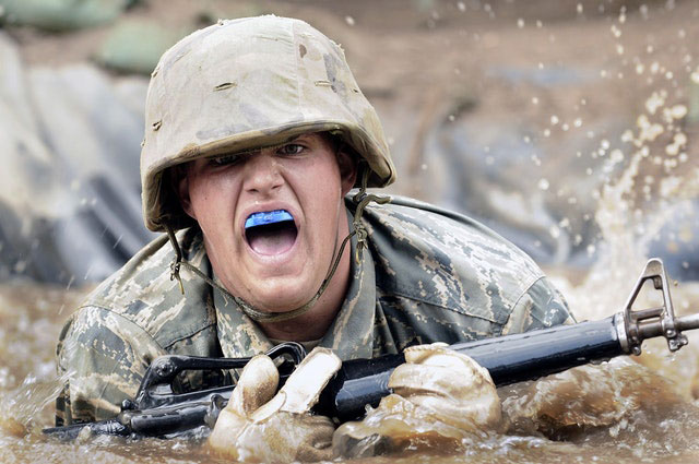 A soldier wearing a custom-fitted mouthguard