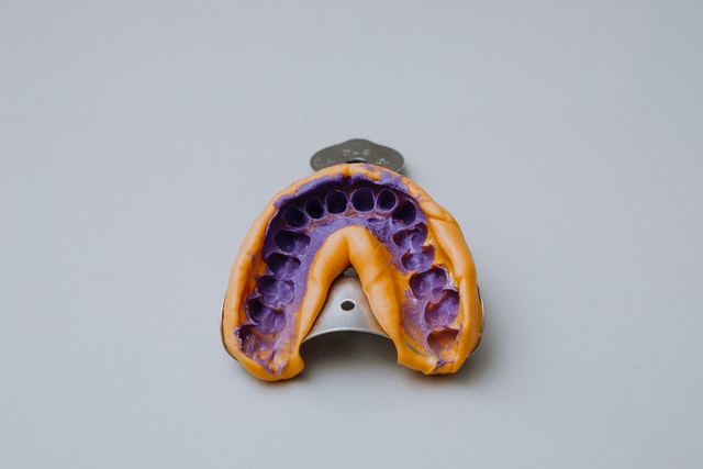 Tooth mold on impression tray.